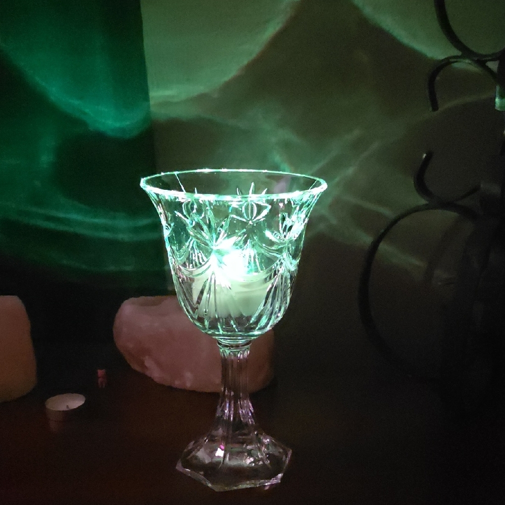 Elegant Crystal Goblet with Green Glow